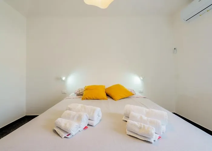 Апартаменты The Riviera Attico Terrazza